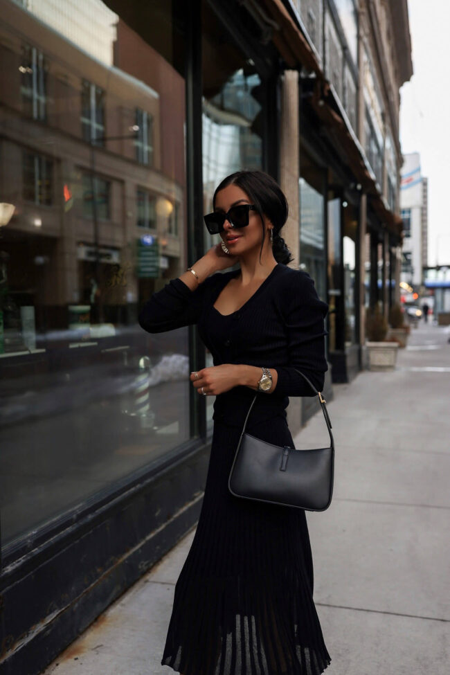 brunette fashion blogger wearing a black skirt and matching set from walmart