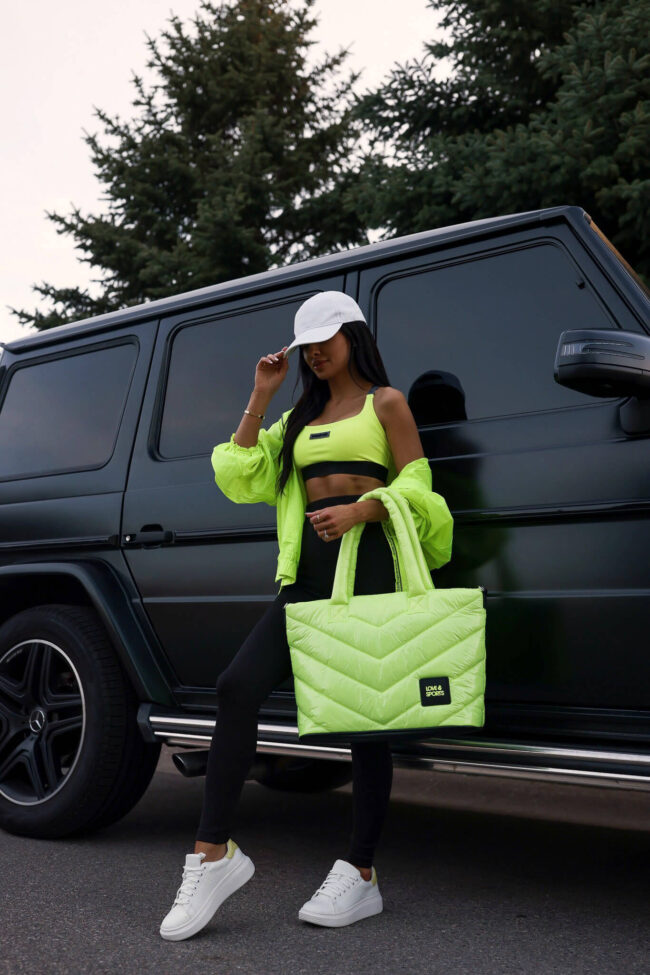 fashion blogger mia mia mine wearing a neon workout from walmart
