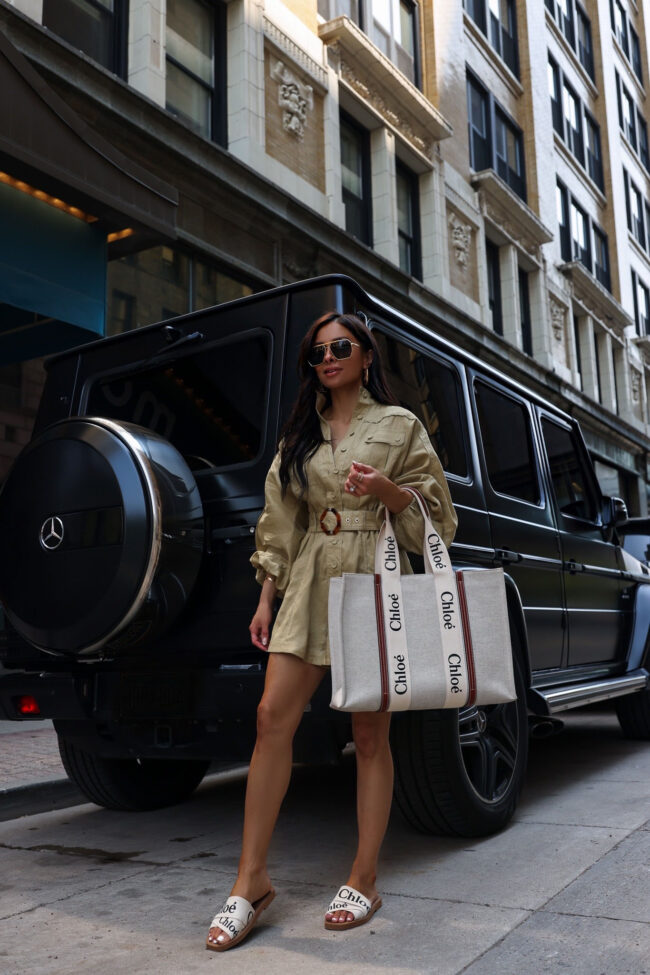 fashion blogger wearing a zimmermann linen romper from saks fifth avenue