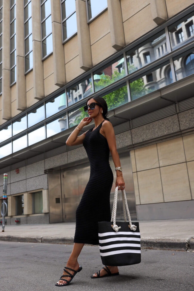 woman wearing a black summer dress from walmart