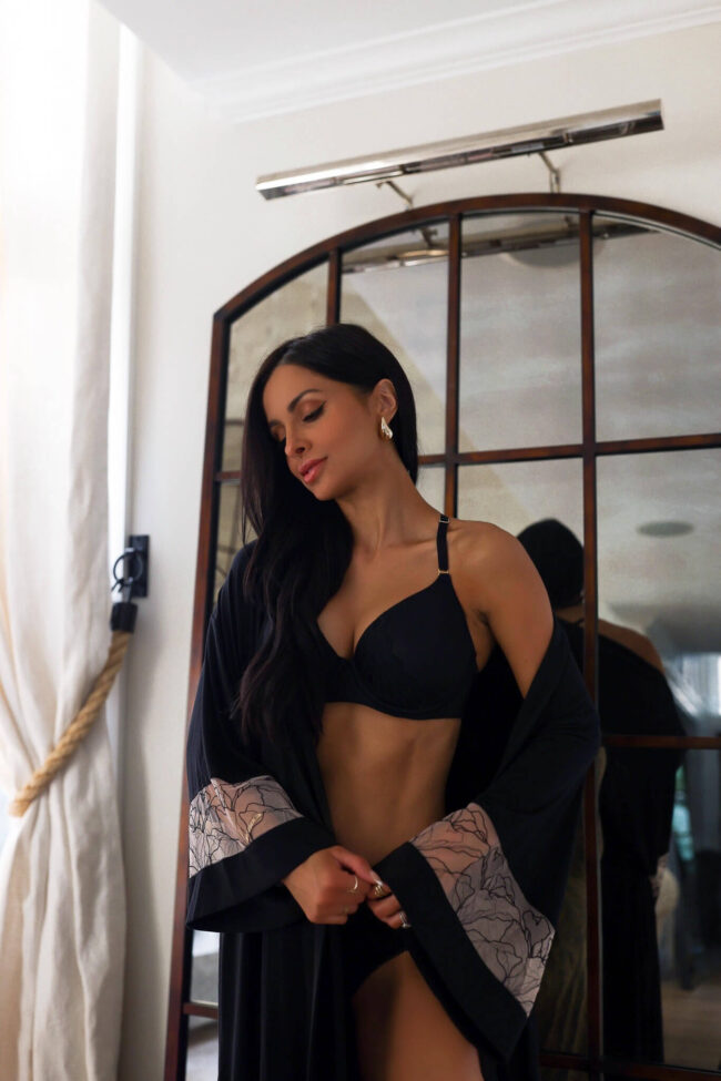 brunette woman wearing a soma intimates embraceable bra