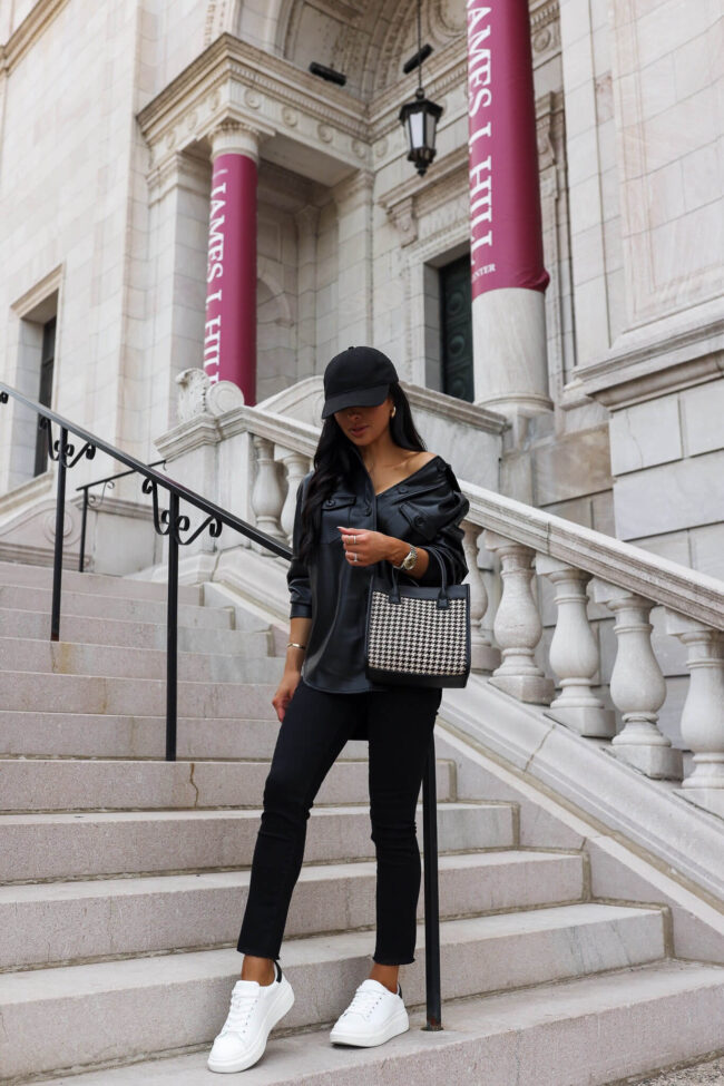 fashion blogger mia mia mine wearing a black faux leather shacket and black cropped denim from walmart