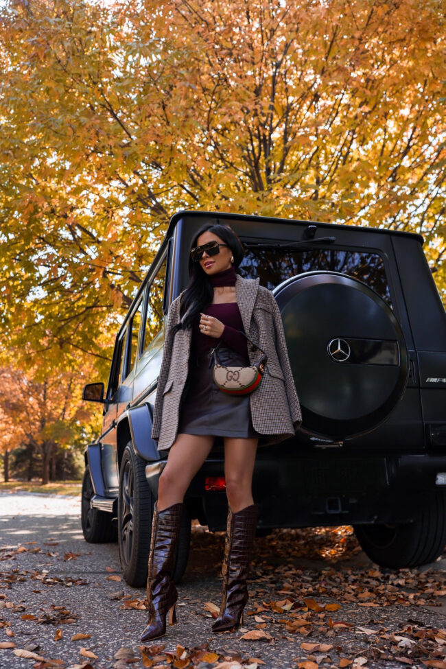 mia mia mine wearing brown croc boots by schutz