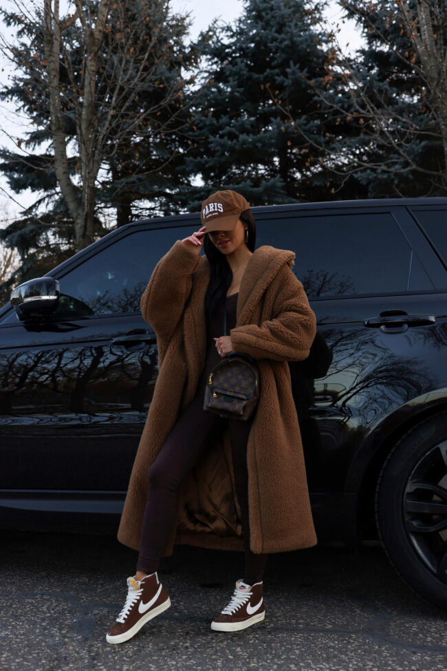 fashion blogger mia mia mine wearing a teddy bear coat by max mara