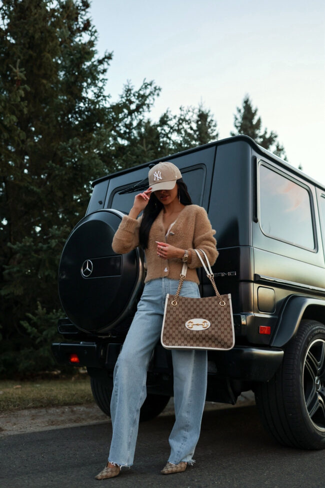 fashion blogger wearing agolde luna jeans from saks fifth avenue