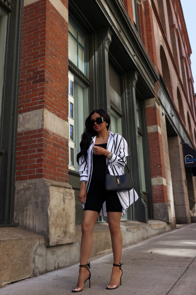 brunette fashion blogger wearing a knit romper from nordstrom