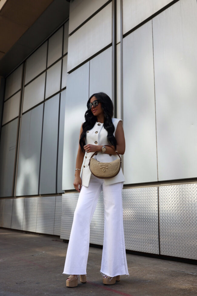 saks fashion blogger wearing an all white spring outfit