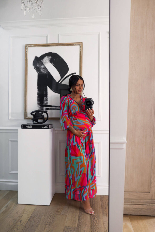 fashion blogger mia mia mine wearing a bump friendly maxi dress from walmart