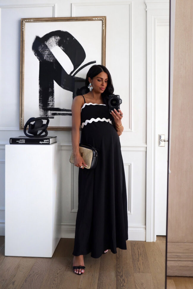 mia mia mine wearing a black maxi dress from amazon