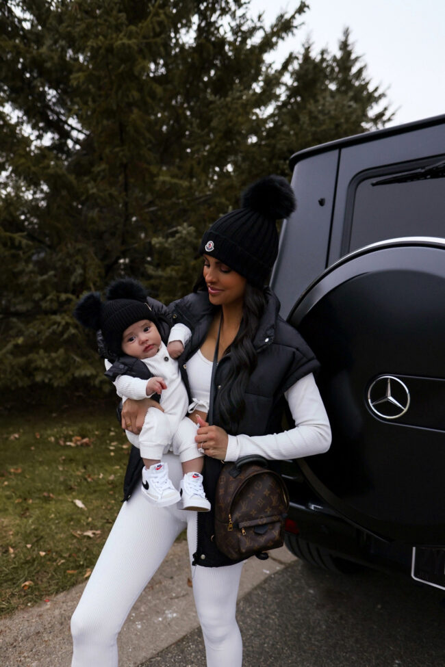 mia mia mine wearing a black puffer vest from amazon