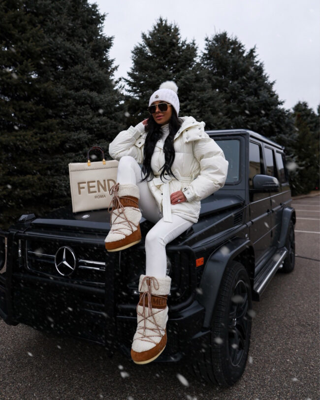 mia mia mine wearing shearling moon boots