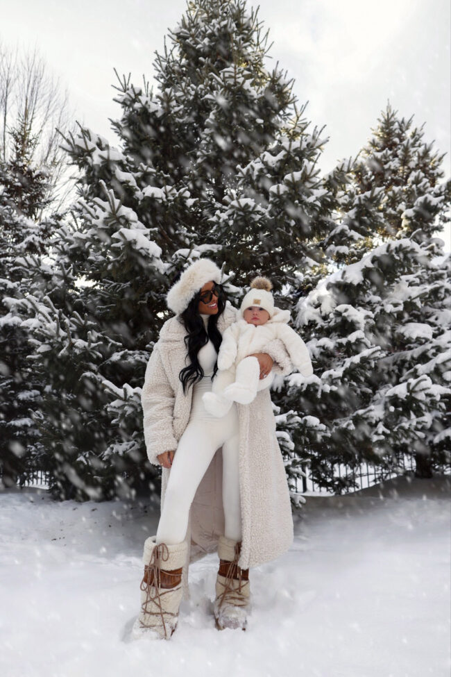 mia mia mine wearing shearling moon boots in the snow
