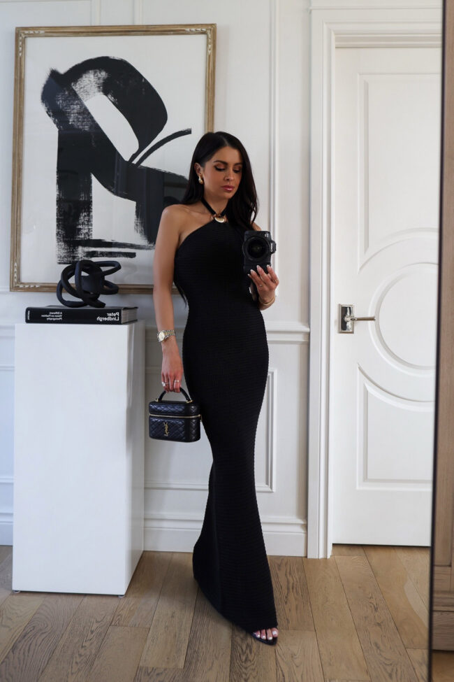 mia mia mine wearing a black maxi dress from nordstrom