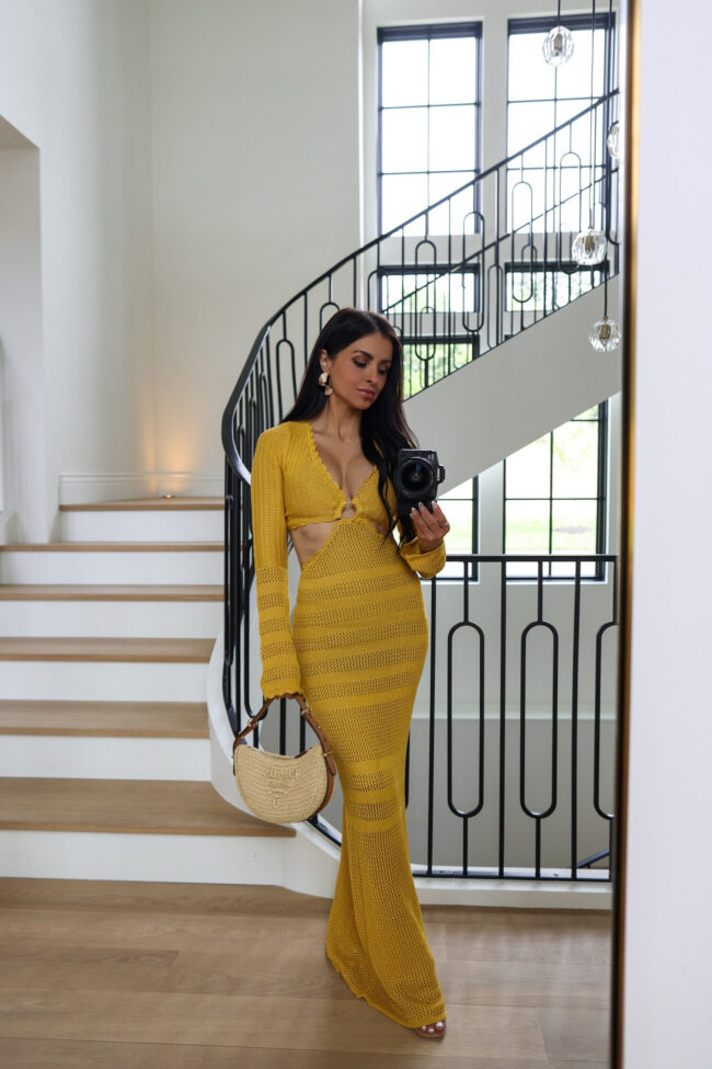 mia mia mine wearing a crochet cutout maxi dress from nordstrom