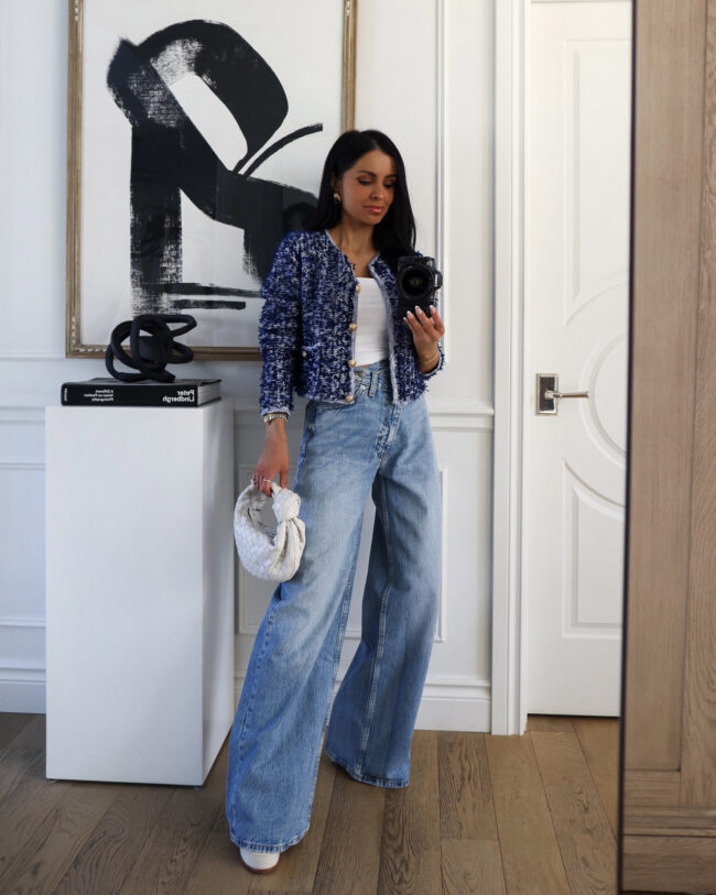 fashion blogger wearing zara cross waist jeans