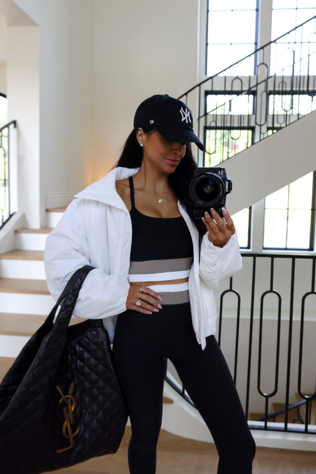 fashion blogger wearing a cropped white jacket from the nsale