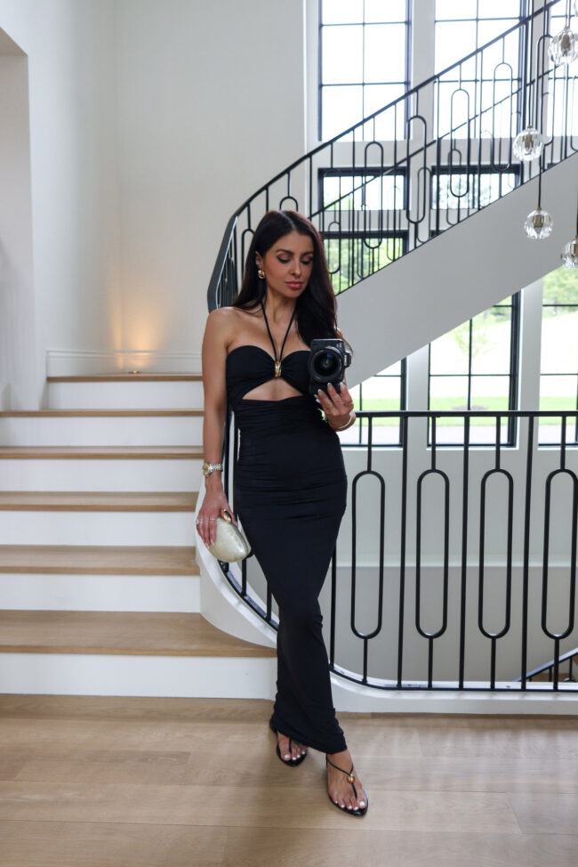 fashion blogger mia mia mine wearing a black cutout dress from zara