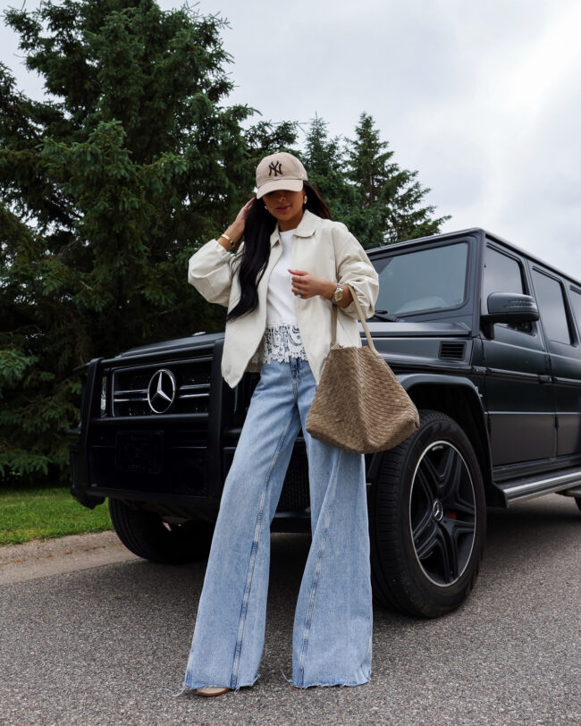 fashion blogger mia mia mine wearing a braided suede bag from amazon