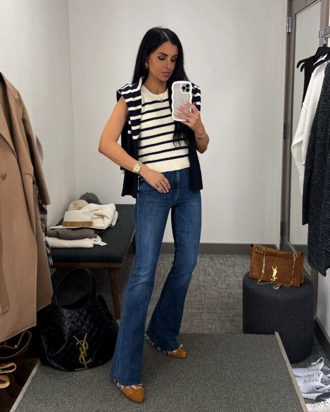 mia mia mine wearing a stripe knit vest and flared jeans from the nsale