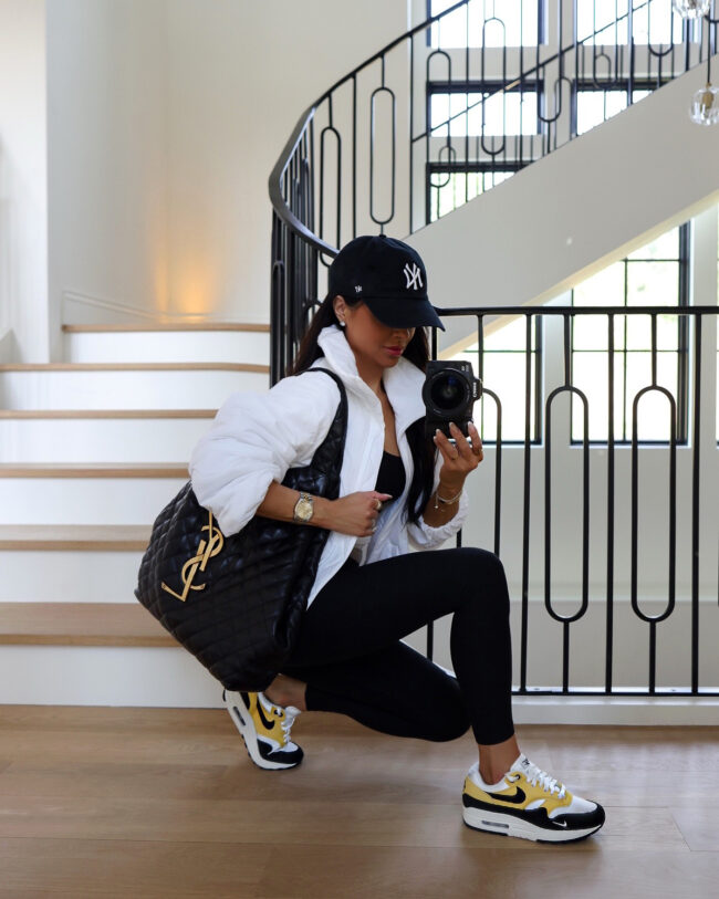 mia mia mine wearing black and yellow nike air max sneakers from the nordstrom sale